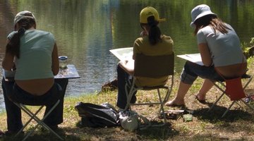 A few student-artists recreating a natural scene