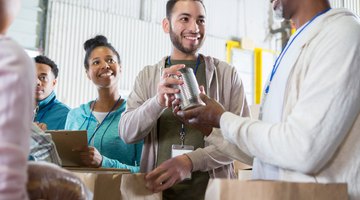 What Are the Pros & Cons of Community Service for High School?