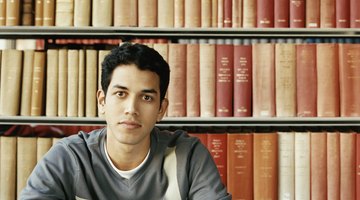 Smiling college student in library.