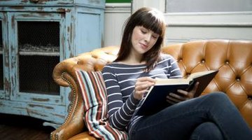 Image of a young woman reading.