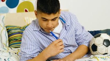 College student studying in dorm room