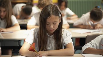 Student taking test in classroom.