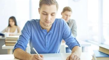 High school student talking PSSA test in classroom
