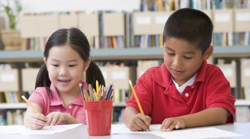 Kindergarten students coloring.