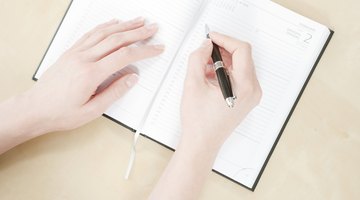 Close-up photo of student filling out calendar