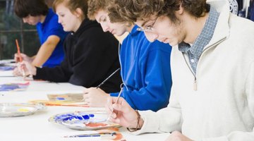 Students painting in classroom