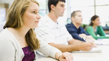 Students watching presentation in classroom