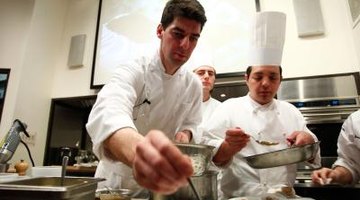 Culinary students at work preparing pastries