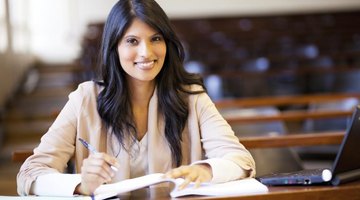 Student taking notes in classroom
