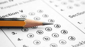 Sharpened pencil on top of multiple choice test