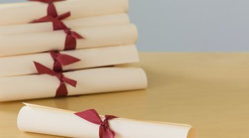 Certificates sitting on a desk.