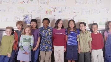 tweens in fron of classroom wall