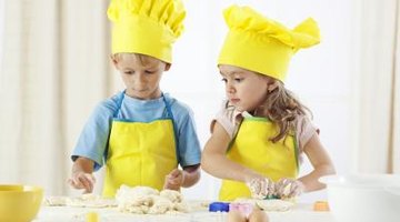 Students are having a fun time making dough.