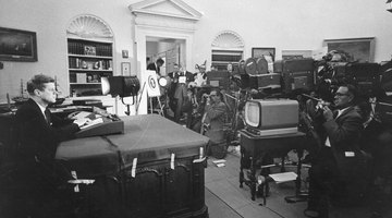 President John F. Kennedy gives a televised speech to the nation about the strategic blockade of Cuba, and his warning to the Soviet Union during the Cuban missile crisis October 24, 1962 in Washington, DC.