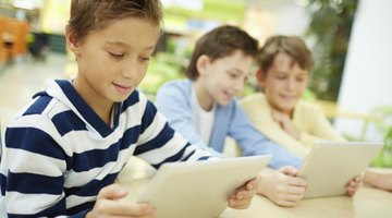 Students using tablets at school