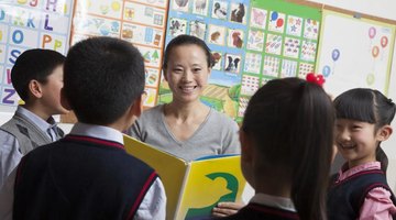 Teacher reading to small group of first grade students.