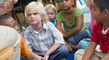 A teacher reads to her class.