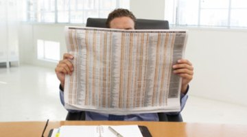 Learn to hold large newspapers comfortably.