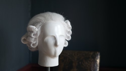 Why did American Colonial Men Wear Wigs?